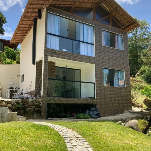 Casa de Campo em Lumiar com corrego ,lareira e churrasqueira