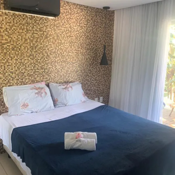 Pratagy Quarto e sala com jacuzzi
