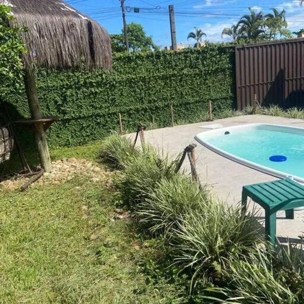Casa com piscina a 500 metros da praia
