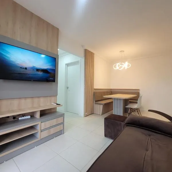 Apartamento novo, vista mar, 150m da praia